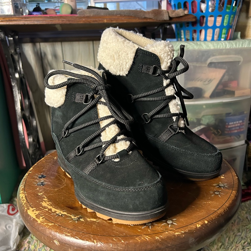 Black and cream Sorel winter fur boots